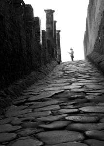 Woman at the entrance to Pompeii