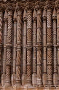 Intricately carved columns that flank the entry to the museum