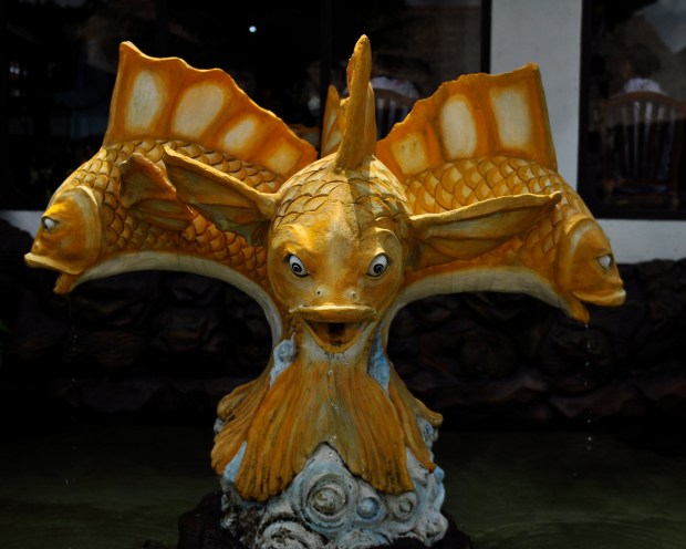 The temple complex at Benugul has many statues of fish around the grounds